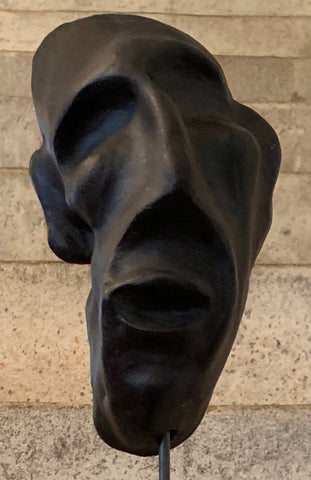 clay sculpture , head sculpture on plinth , ceramic face mask